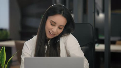 Smiling Happy Friendly Caucasian Businesswoman Girl Office Worker Typing Laptop Talking Mobile Phone