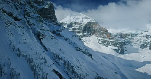 Snow-covered mountains in Banff National Park, aerial