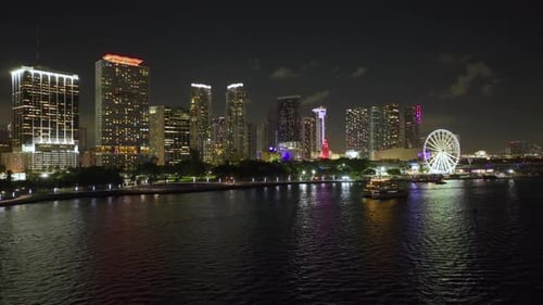 View From Above of Brightly Illuminated High Skyscraper Buildings in Downtown District of Miami