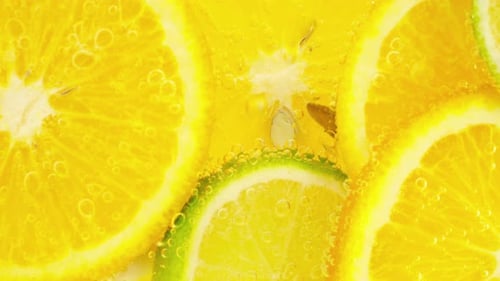 Citrus Fruit Slices in Sparkling Refreshing Water