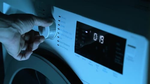 Setting Wash Program on Automatic Washing Machine – Close Up