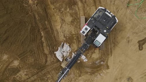 Aerial View Project Begins Concrete Work and Heavy Machinery