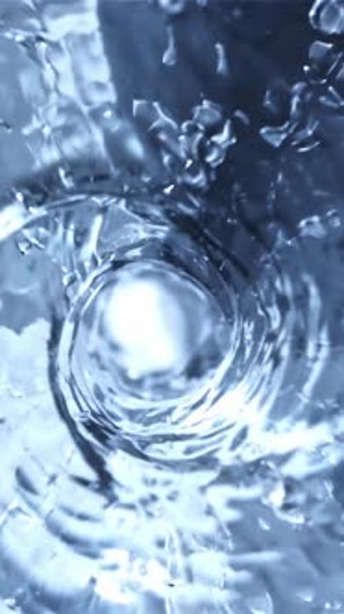 Rotation of Water By a Whirlpool with Air Bubbles Filmed is Slow Motion 1000 Fps