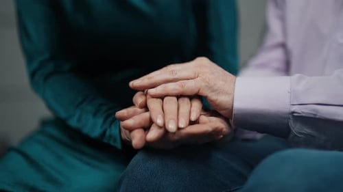Senior Woman Stroking Man Hands Tender Gentle Elderly Wife Supporting Husband Caring in Stress
