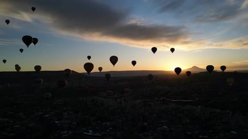 Aerial View of Hot Air Balloons Flying in Goreme National Park Cappadocia Turkey