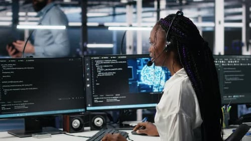 Admin in Data Center Wearing Headset Assisting Users with AI