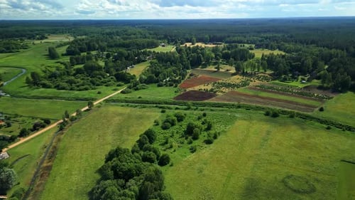 Aerial Aerial Views Showcasing Lush Green Fields and Expansive Farmland in a Beautiful Scenic
