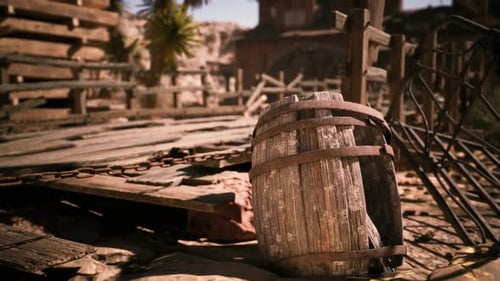Weathered Wooden Barrel Resting on the Ground in an Abandoned Desert Town