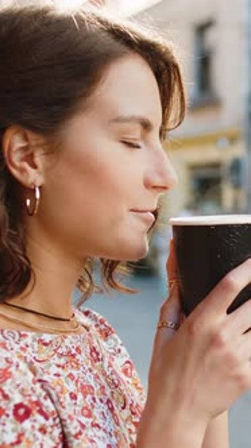 Caucasian Woman Enjoying Drinking Morning Coffee Hot Drink Relaxing Taking a Break in City Street