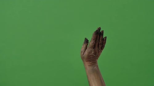 A Creepy Zombie Hand Taps and Swipes