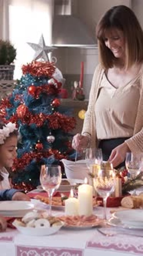 Family Celebrates Christmas at Home Over Festive Meal
