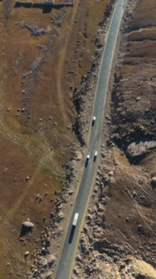 Aerial view of road with vehicles, Pakistan.