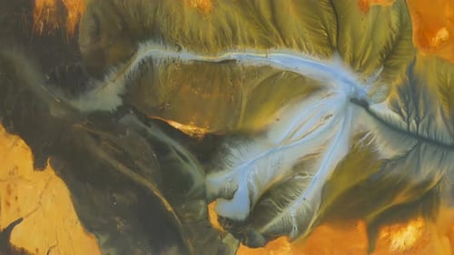 Industrial mining colorful residual waters background in decanting lake aerial view