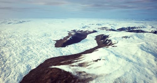 Breathtaking Aerial View of Vast Snowy Landscape in Remote Wilderness