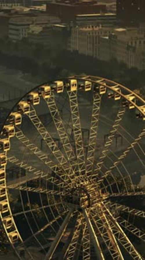 Aerial View of Ferris Wheel in City