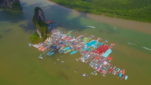 Picturesque Floating Village and boats in Tropical Thailand