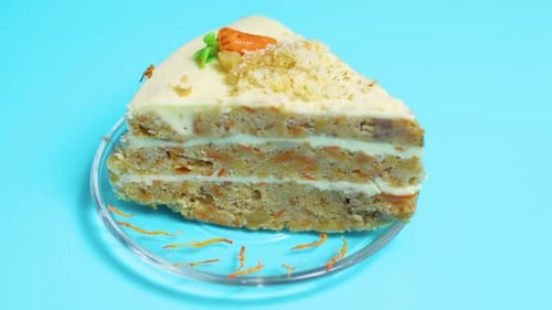 Delicious Slice of Carrot Cake with Creamy Frosting