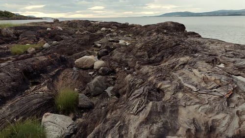 Aerial Glance at Volcanic Rocky Norway Amidst Cloudy Cold Weather Untamed Wilderness