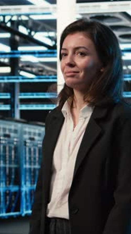 Vertical Video Smiling Data Center Manager Taking Virtual Tour Using AR Technology