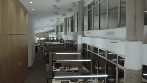 modern empty office, top view slow flight over workplaces