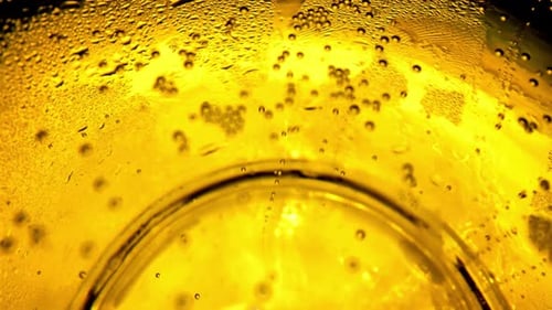 Close Up of Bubbles in a Glass of Beer