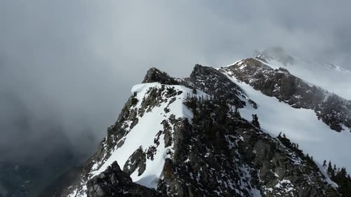 Snowy Mountain Peak With Dramatic Clouds. British Columbia, Canada.