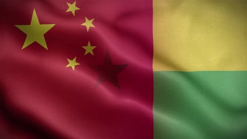 Waving National Flags of China and a Green Yellow Nation