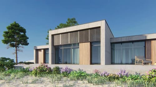Modern beach house with flowers and trees on sandy shore