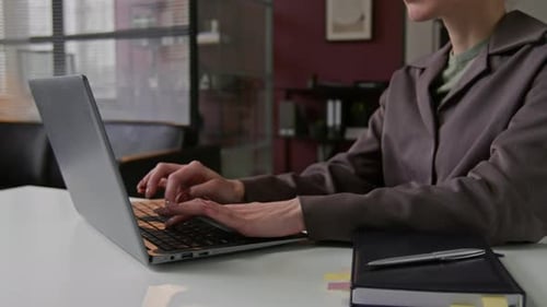 Young Female Manager Focusing On Work