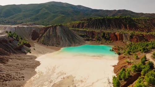 Aerial drone turquoise mining lake colorful quarry landscape Greece