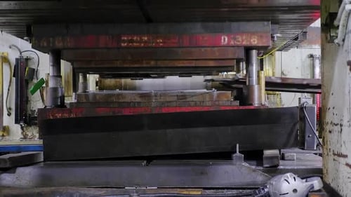 large industrial machine pressing parts