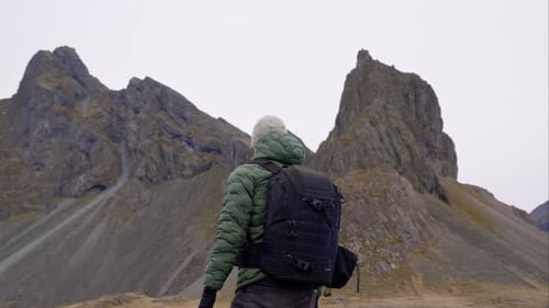 Man in Backpack Before Eystrahorn Mountain