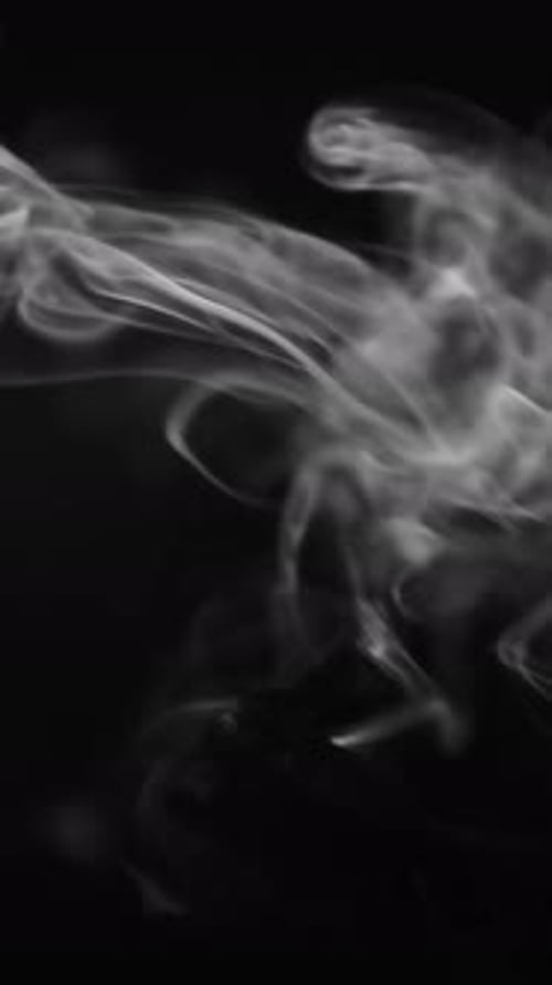 Cigarette Smoke on Black Background Slow Motion