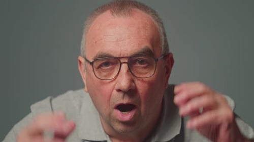 Man is Shocked and Removes Glasses