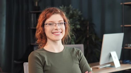 Portrait of Confident Businesswoman Woman Looking to Camera in Office