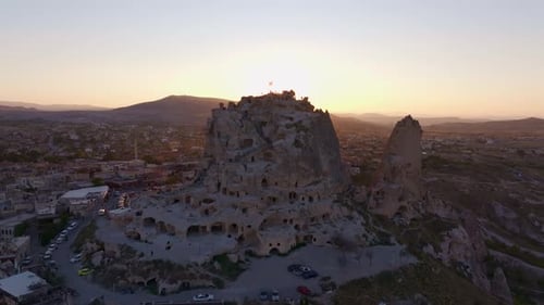 Aerial view of uchisar castle at sunset, Turkey.