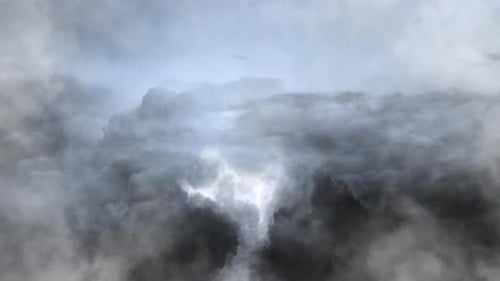 a thunderstorm inside the gray cloud, cumulus clouds
