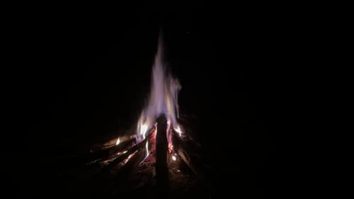 Campfire with Bright Flames Burning at Night