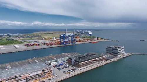 Large Container Cranes at a Shipping Terminal in the Port of Copenhagen Aerial Panoramic View