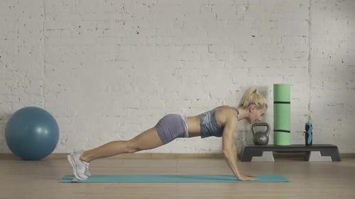 Healthcare and Wellness Advertisement Concept Athletic Woman Fitness Coach Doing Body Turns and Arm