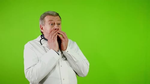 Shocked Doctor Reacting to Bad News on Green Screen