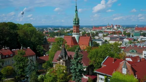 Aerial view of Podgorze district in Krakow, Poland. Slow movement around church.