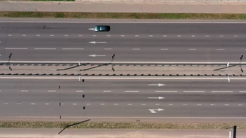 Almost Empty Highway with One Car Passing