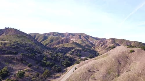 4K Aerial Drone shot of Santa Monica Mountains in Los Angeles, California on a warm sunny spring day