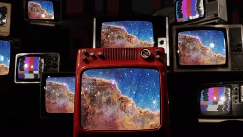 Retro TVs Displaying Space Nebula