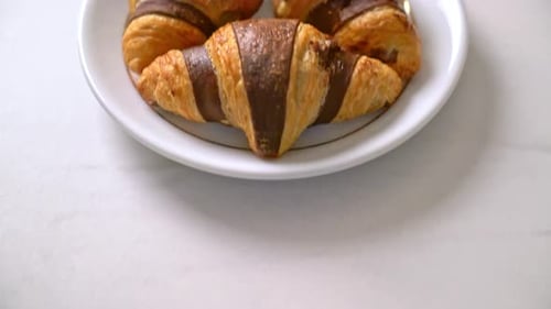 Chocolate Croissants on a White Plate