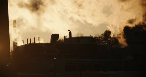 Chemical Factory Emitting Thick Toxic Smoke Pollution during Sunset. Industrial Smog Emissions Silho