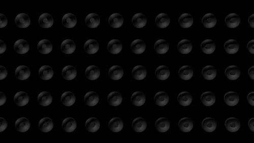 Dynamic black spheres pulsing in elegant dark abstract pattern