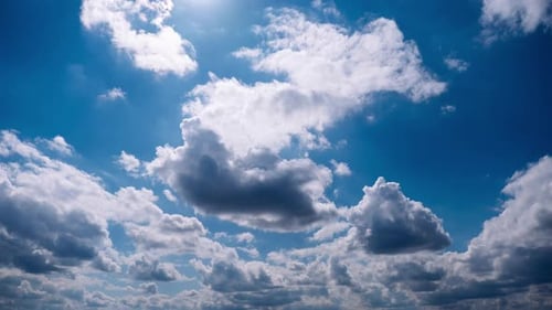 Timelapse of Cumulus Clouds Moves in the Blue Sky
