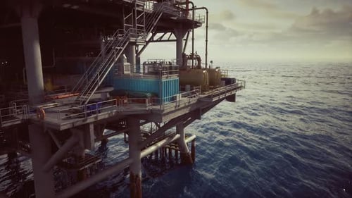 Serene Ocean View Featuring Offshore Rig at Sunset with Textured Steel Elements